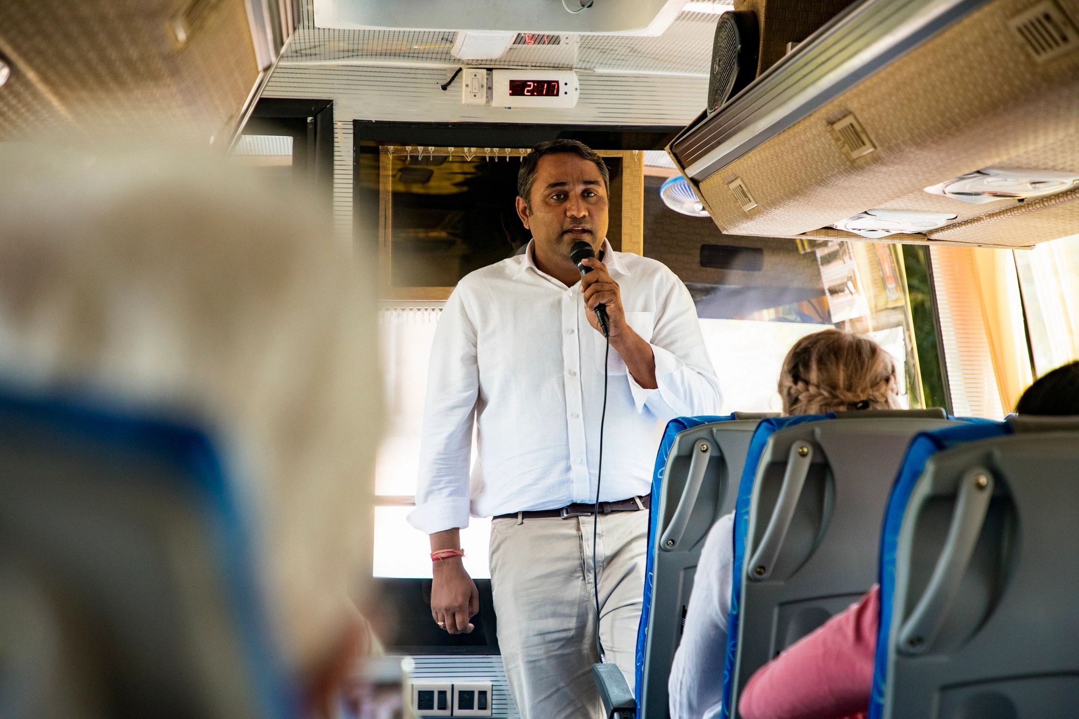 Tour guide speaking with travelers